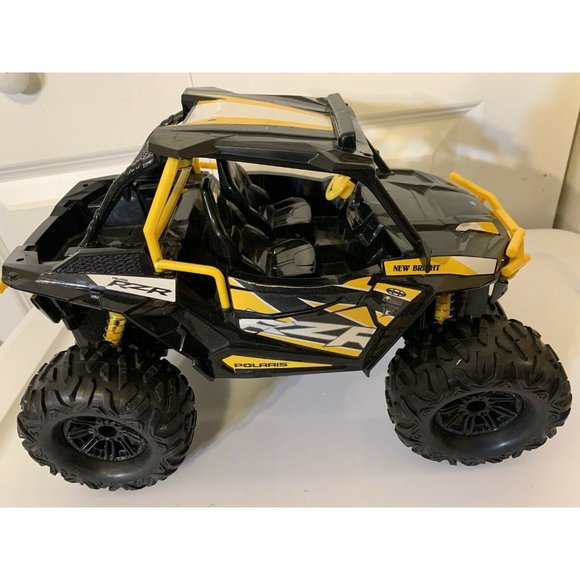 New Bright RC 1:14 Scale Polaris RZR ATV - Yellow no remote no battery cover 13” - Picture 1 of 12